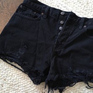 Free people ripped black denim shorts